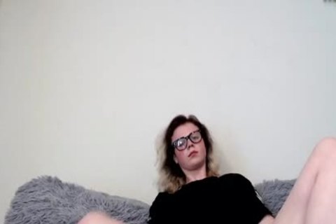 Petite shelady beauty In  Glasses Stroking Her gigantic penis Until she sperm Shottting