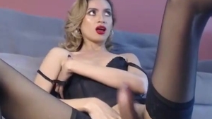 slim Colombian t-girl In darksome lingerie And stockings Tugs Her enormous 10-Pounder