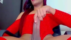 Purple-haired skinny latin chick shemale In Red nylons Strokes Her large 10-Pounder On webcam